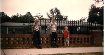 Sanders brothers outside of Elvis's first home on Audobon Drive Memphis